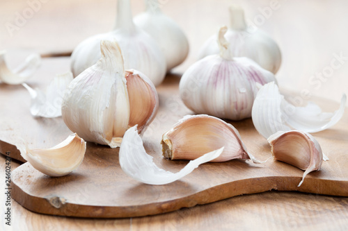 Garlics on wooden board