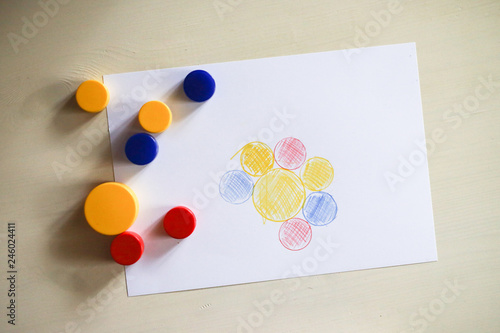 colored toys for classes with children on table