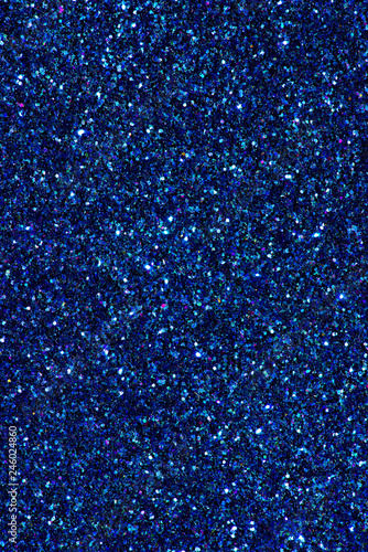 Shiny sparkle blue background texture.