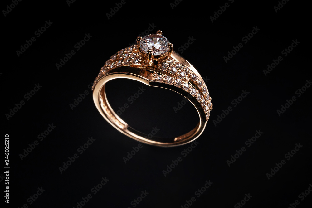 Ring of gold decorated with lots of stones Ring of gold decorated with lots of stones