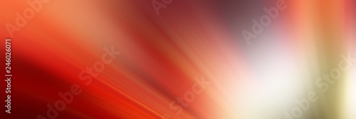 colored radial rays, blurred background.
