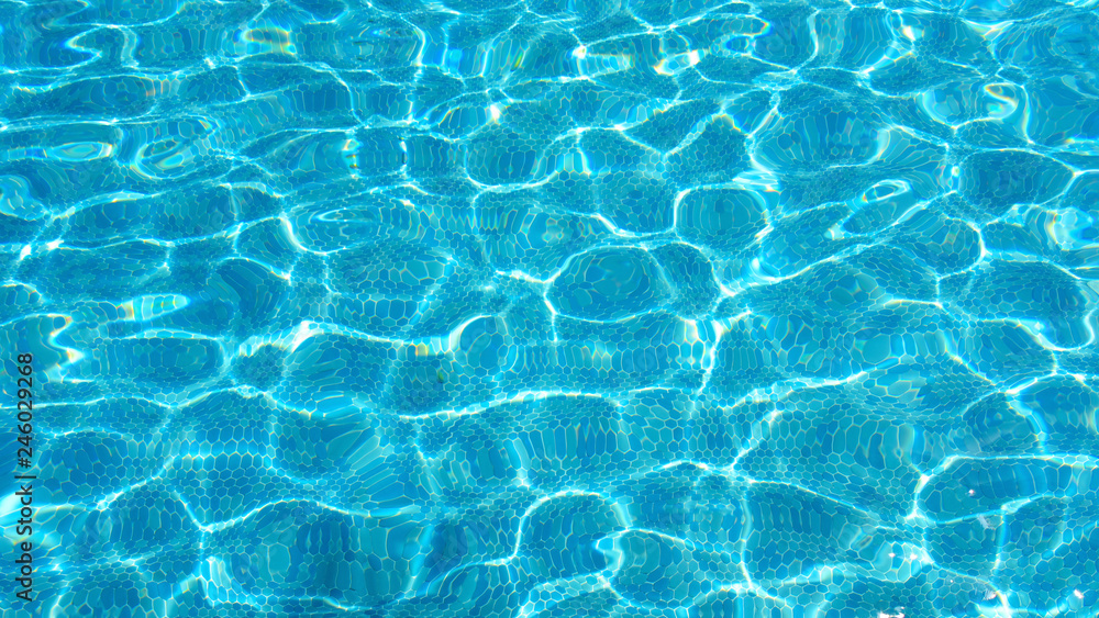 Ripples on the surface of the water in the pool.