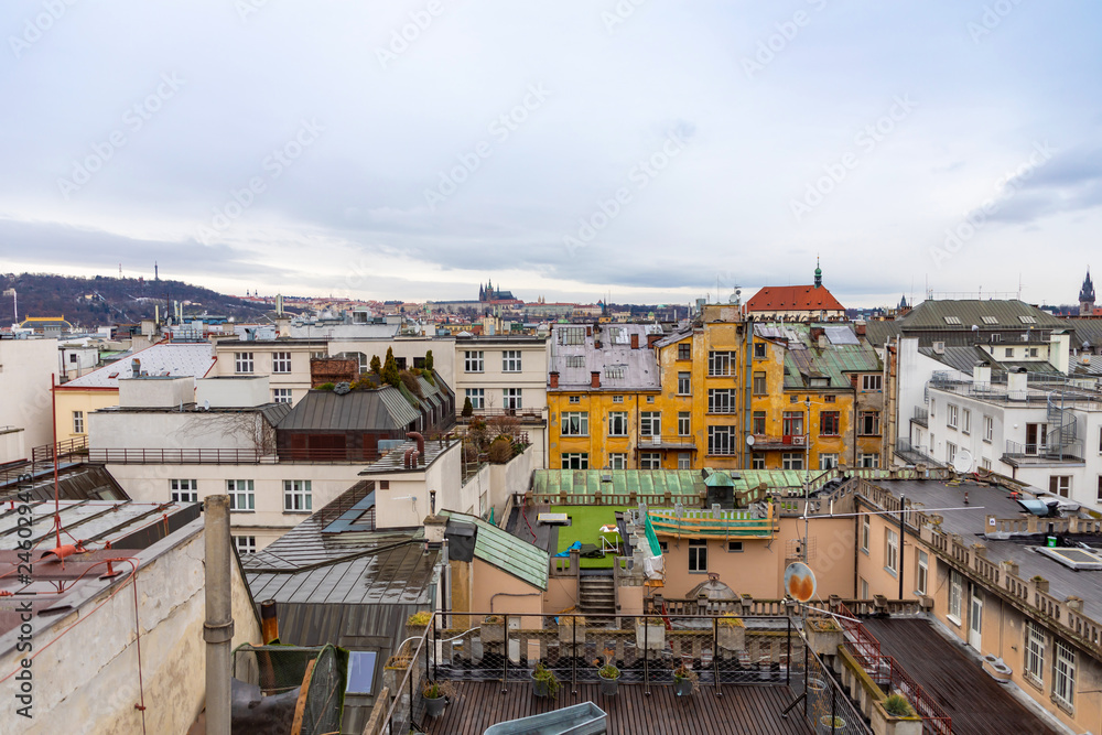 View of Prague roofs and Prague castle from Palac Lucerna