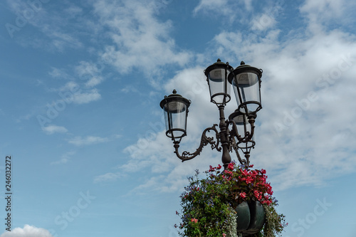 Obraz na płótnie Beautiful night lamp with flowers In Prato della Valle, Padua, Veneto, Italy w salonie