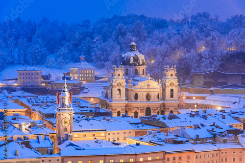 Salzburg, Austria: The Kollegienkirche, Collegiate Church, is the church of the University of Salzburg, covered with snow, during winter photo