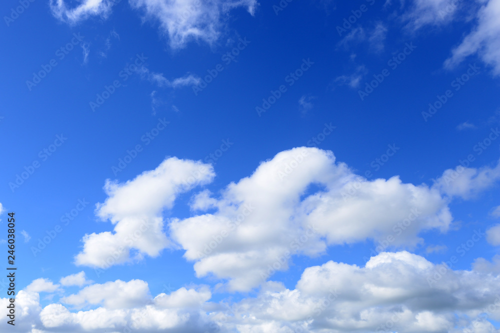 Obraz premium Blue Sky Background With White Clouds