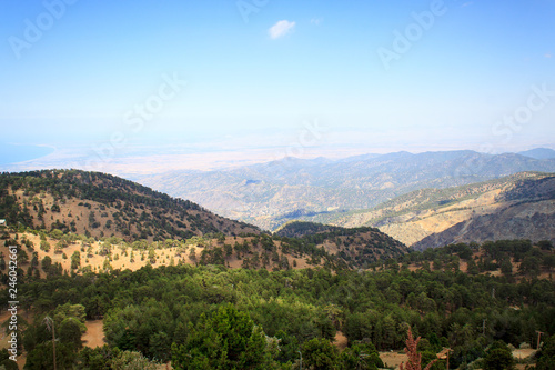 Beautiful scenic view of the panorama of green hills and hills of mountains from the Trodos mountain on the island of Cyprus