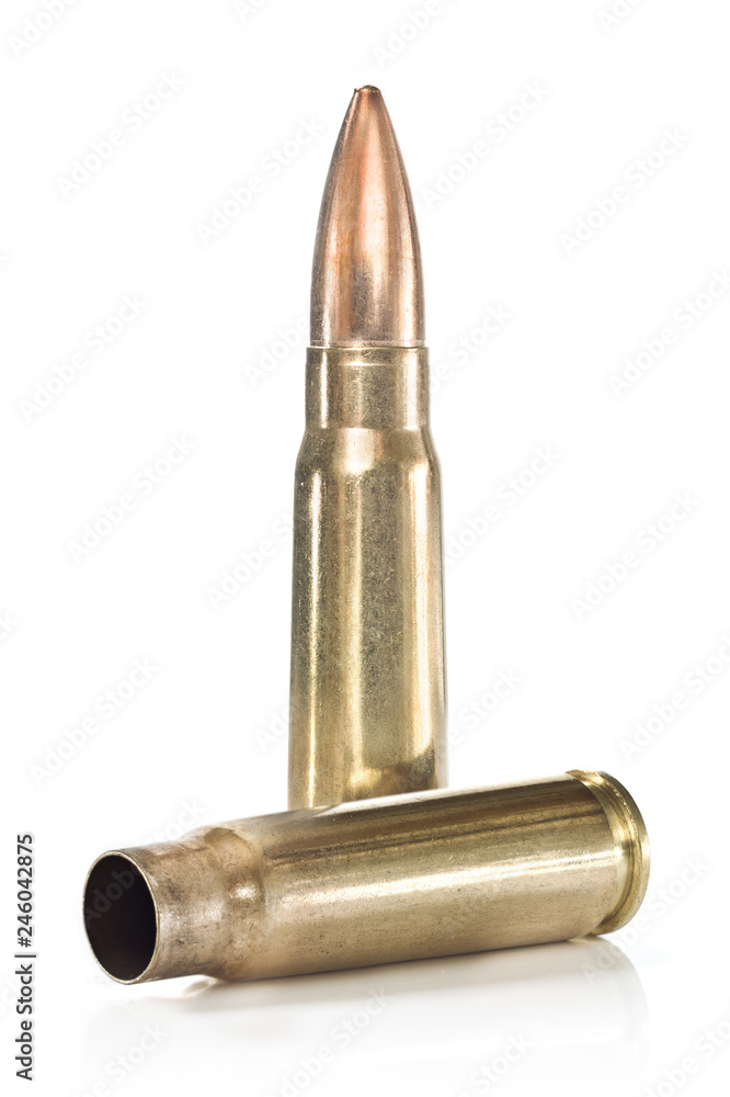 Two golden rifle cartridges isolated on white background Two golden rifle cartridges isolated on white background