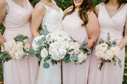 bridesmaids and flowers photo