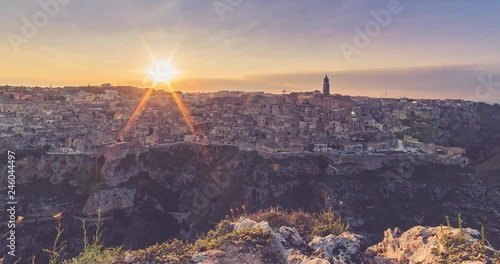 Matera. Timelapse of the stones of Matera, Sassi in Basilicata, Italy with clouds moving. sunset time