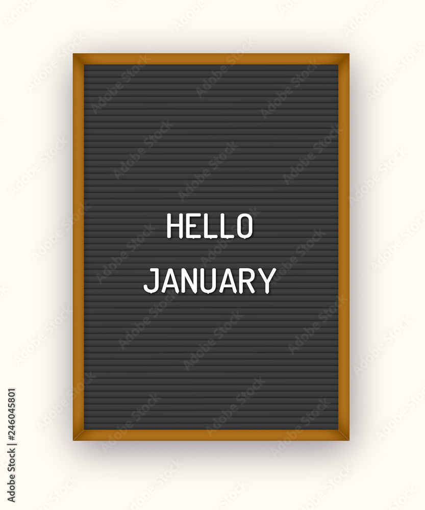 Hello January motivation quote on black letterboard with white plastic letters Hello January motivation quote on black letterboard with white plastic letters