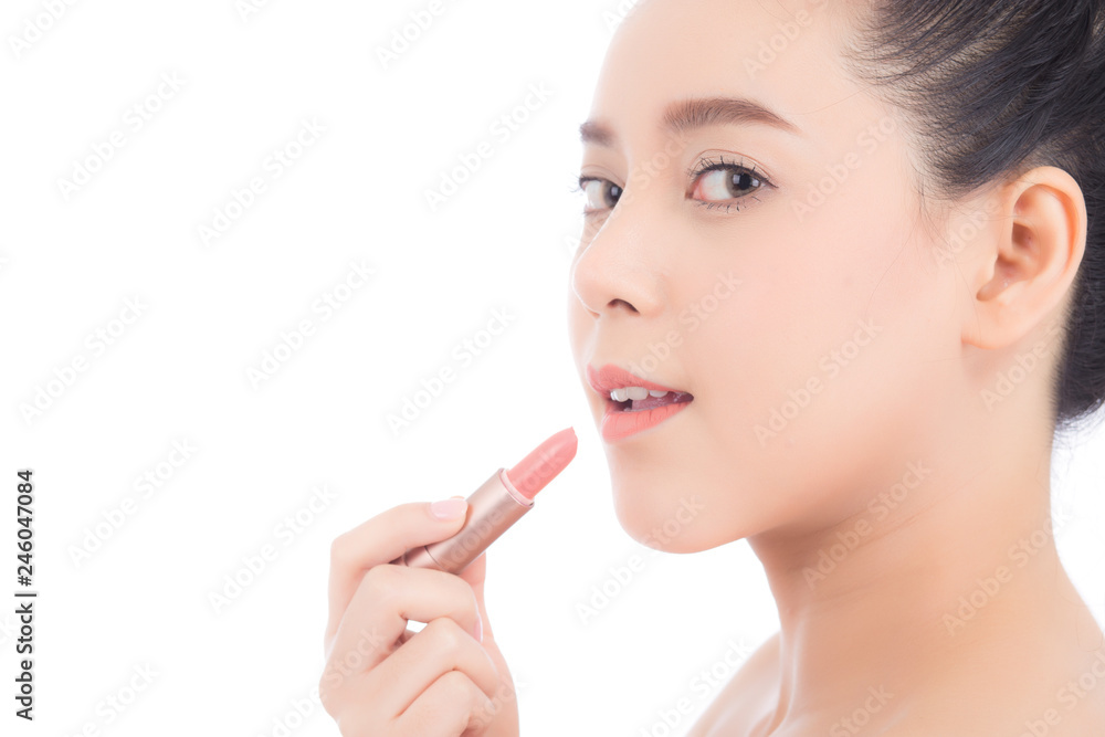 Beauty of portrait asian woman applying make up with lipstick of mouth isolated on white background, Beautiful girl on lips with happy, skincare and cosmetic concept. Beauty of portrait asian woman applying make up with lipstick of mouth isolated on white background, Beautiful girl on lips with happy, skincare and cosmetic concept.