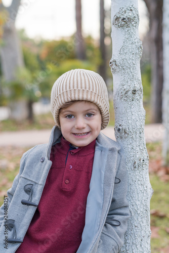 Child posing with warm clothes.