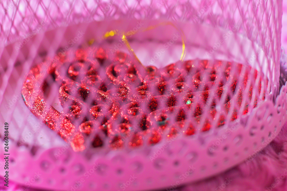 ornate heart in romantic cage - closeup ornate heart in romantic cage - closeup