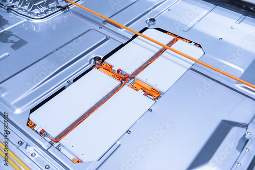EV car battery pack. Electric car lithium battery pack. Blue toned. Car maintenance.