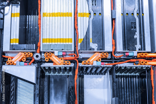 EV car battery pack. Electric car lithium battery pack. Blue toned. Car maintenance.