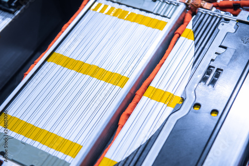 EV car battery pack. Electric car lithium battery pack. Blue toned. Car maintenance.