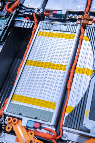 EV car battery pack. Electric car lithium battery pack. Blue toned. Car maintenance.