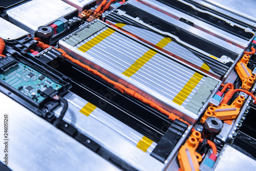 EV car battery pack. Electric car lithium battery pack. Blue toned. Car maintenance.