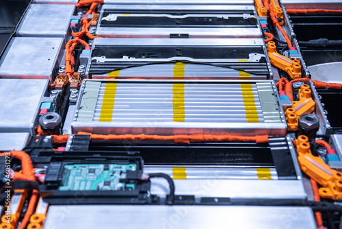 EV car battery pack. Electric car lithium battery pack. Blue toned. Car maintenance.