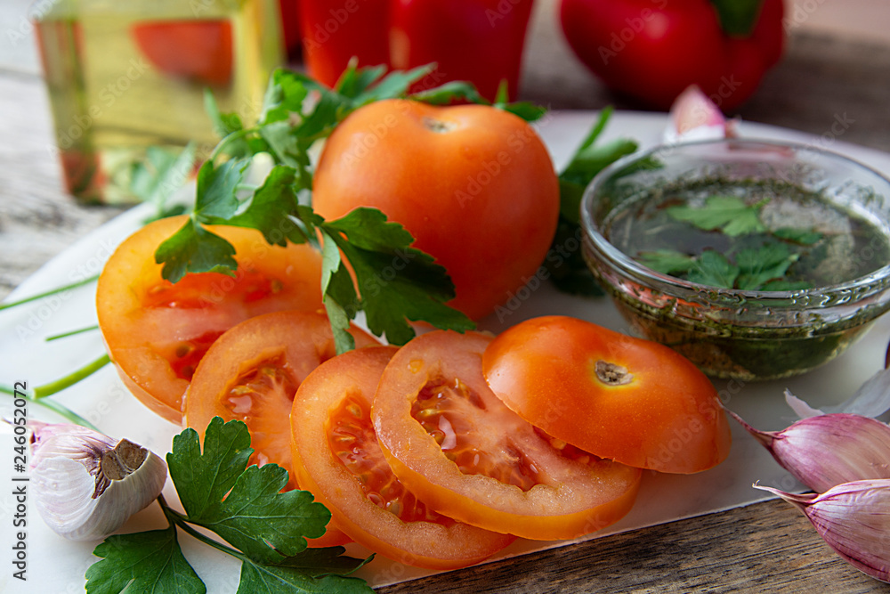 Fresh red tomatoes with spices and olive oil. Fresh red tomatoes with spices and olive oil.