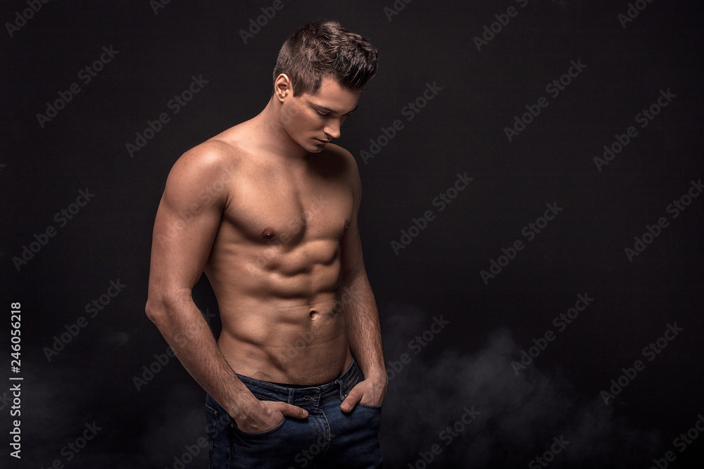 Handsome shirtless man in studio. Stock Photo | Adobe Stock