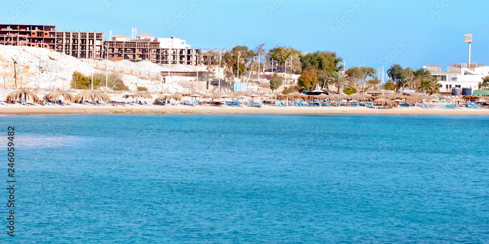 Beach and waves from top view. Turquoise water background from top view. Summer seascape from air. Top view from drone. Travel concept and idea Beach and waves from top view. Turquoise water background from top view. Summer seascape from air. Top view from drone. Travel concept and idea
