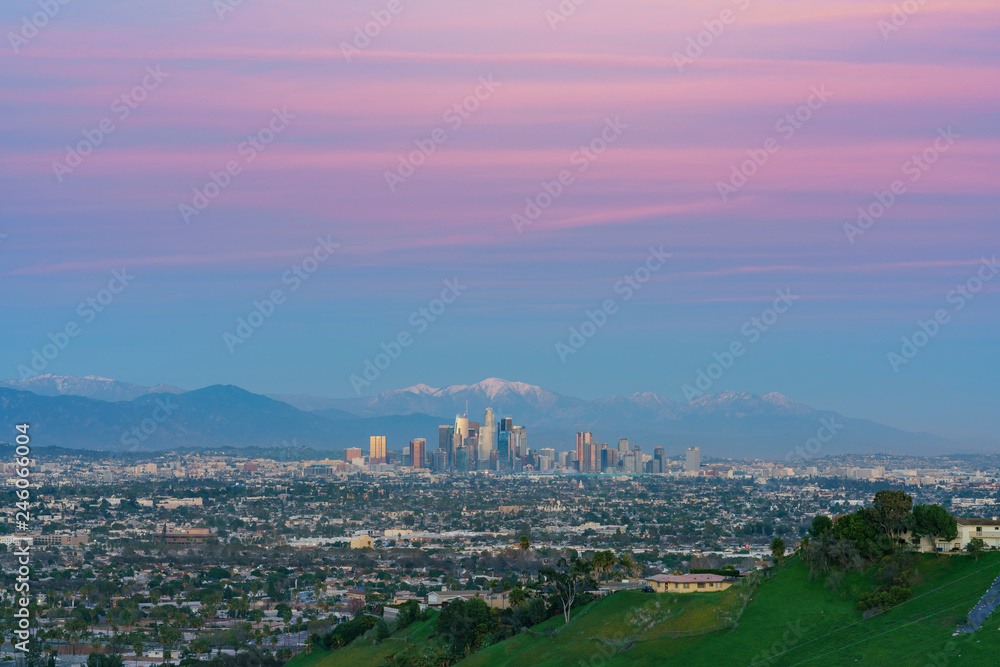 Sunset aerial view of the beautiful Los Angeles downtown cityscape with mt. Baldy