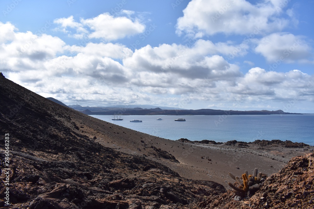 Mountain landscape with boats on the ocean Mountain landscape with boats on the ocean