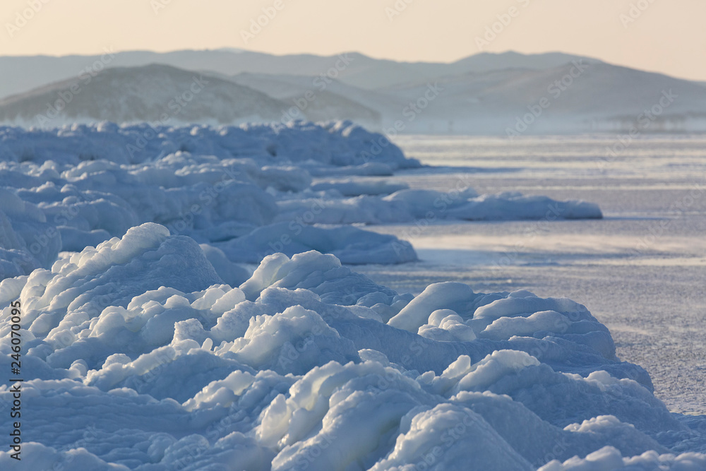 Shore of lake Baikal covered with ice