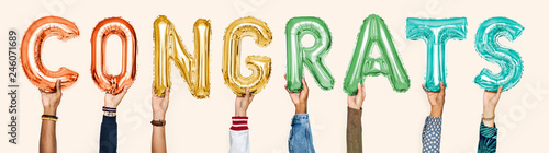 Colorful alphabet balloons forming the word congrats photo