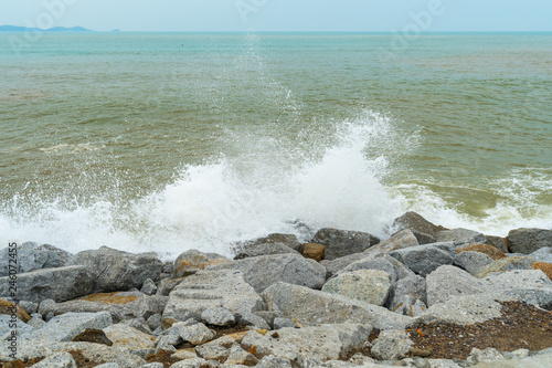 sea wave with stone at Khao Laem Ya in Mu Ko Samet National Park, Rayong, Thailand