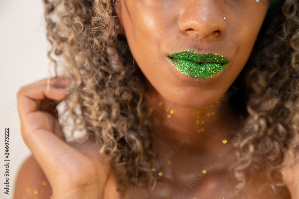 Beauty young elegant african american woman with afro. Brazilian girl. Mixed race. Brazilian race. Green lips. Studio shot. Beauty young elegant african american woman with afro. Brazilian girl. Mixed race. Brazilian race. Green lips. Studio shot.