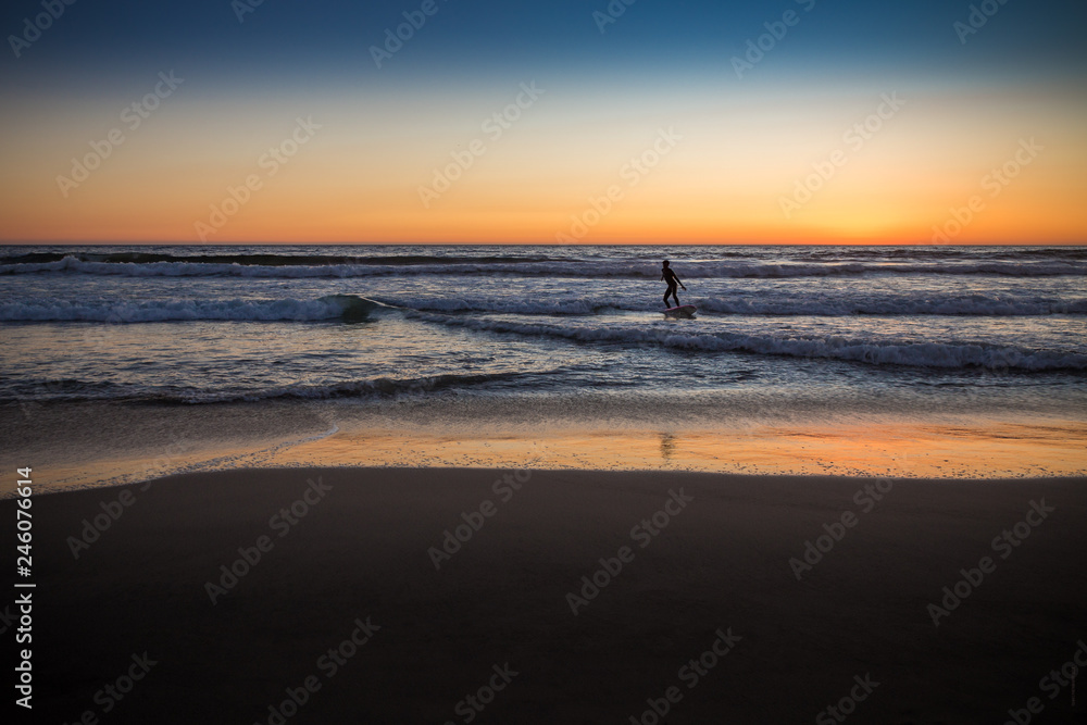  Surfer Surfing at Sunrise