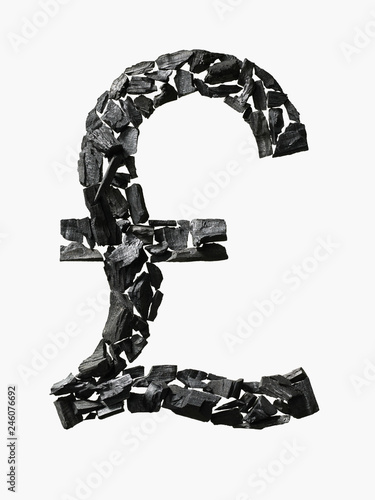 Great British Pound symbol made out of Coal photo