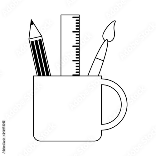 ruler pencil and paint brush in cup black and white
