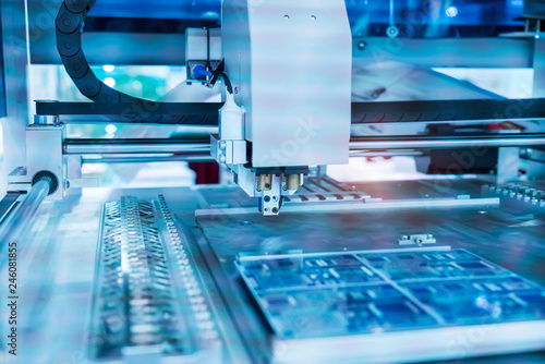 Fotografie PCB Processing on CNC machine,Production of electronic components at high-tech f
