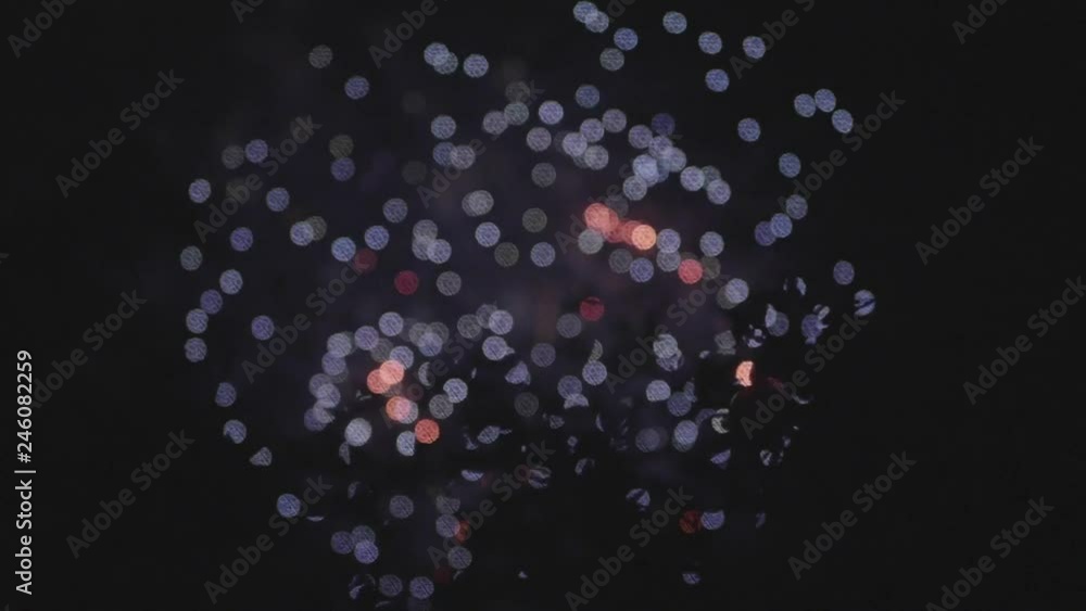 Fireworks out of focus with nice colorful bokeh in slow motion