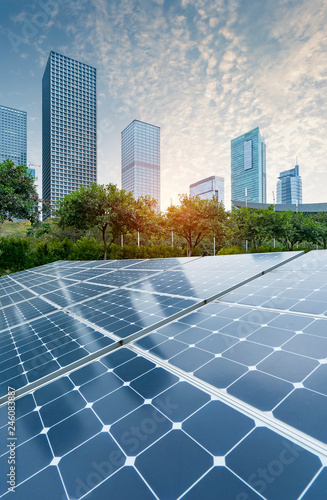 Ecological energy renewable solar panel plant with urban landscape landmarks