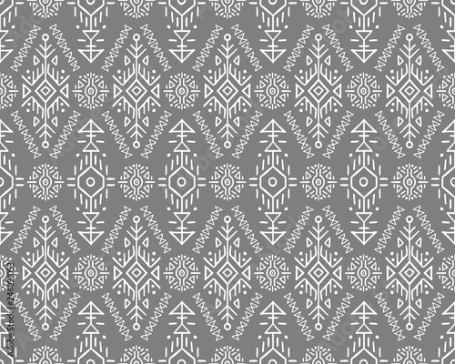 Vector Seamless Pattern in Ethnic Style. Trendy hand drawn boho tile. Creative tribal endless ornament, perfect for textile design, wrapping paper, wallpaper or site background.