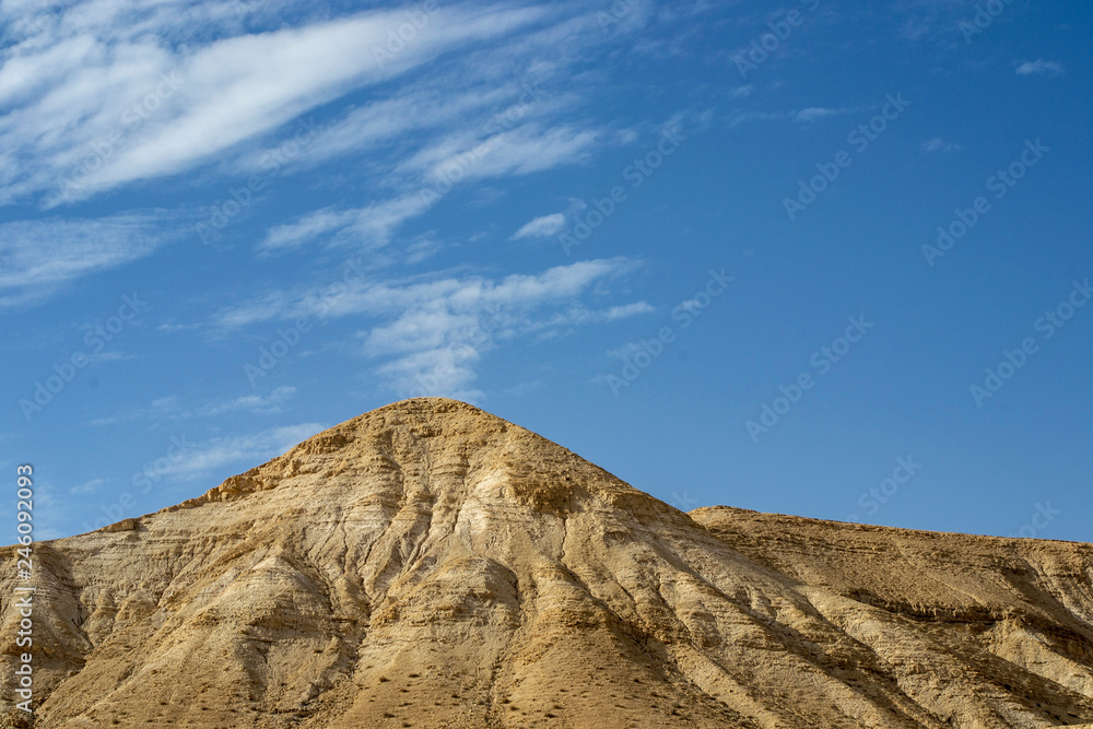 Judean Desert mountains and blue sky background landscape