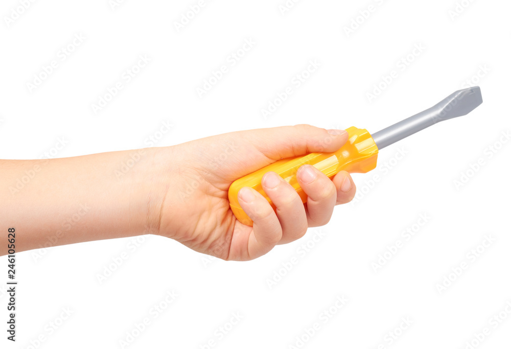 Kids hand with yellow toy screwdriver, repair tool Kids hand with yellow toy screwdriver, repair tool