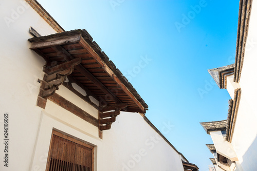 Two row of The traditional Chinese roof and wall against a blue sky. Old houses in the Three Lanes and Seven Alleys, most famous place in Fuzhou,Fujian,China