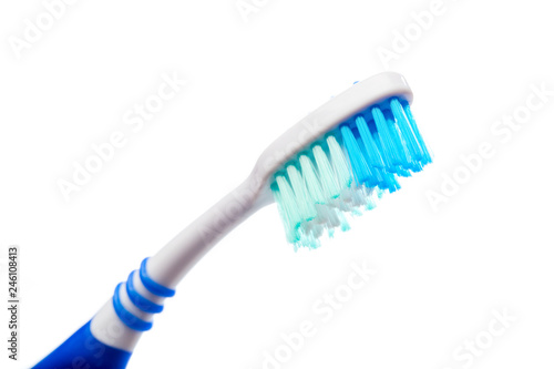 colored toothbrush on an isolated background  close up