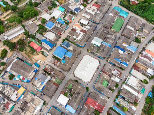 Aerial view of roof residential with traffic road crowded at rural