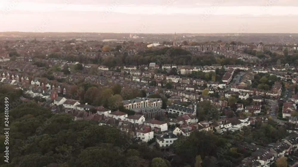 Aerial panning view of a typical Edwardian village in North London at sunset Aerial panning view of a typical Edwardian village in North London at sunset