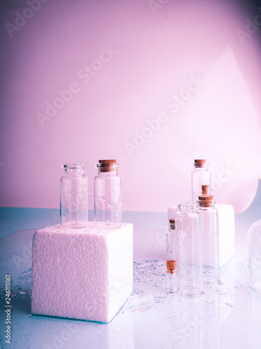 Few transparent bottles, water sprays. empty glass bottles. photo