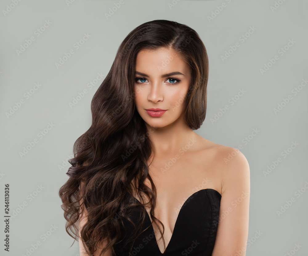 Young woman with curly hair, fashion portrait Young woman with curly hair, fashion portrait