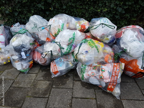 Bags with waste of plasic to be collected by the municipality of Zuidplas photo