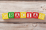 Wooden toy Blocks with the text: gracias